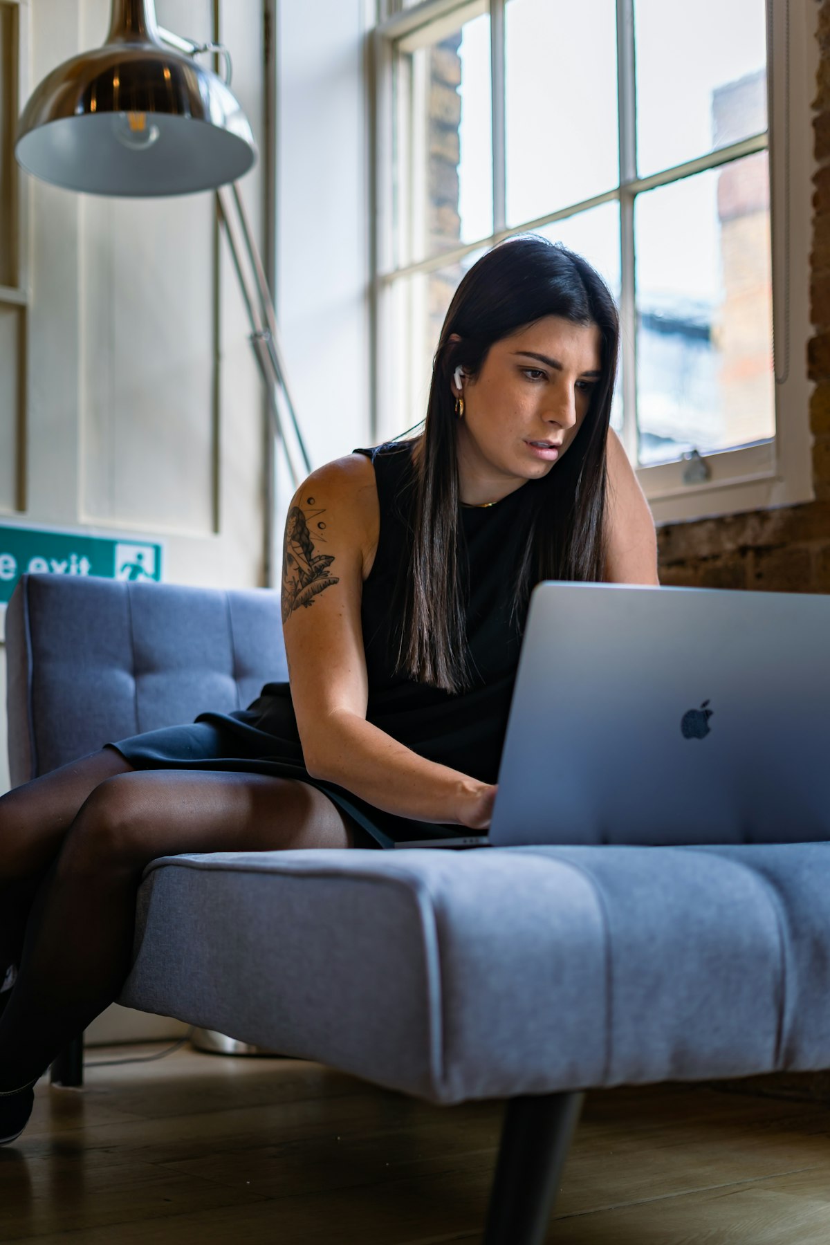 Person comparing pet insurance quotes on a laptop at home
